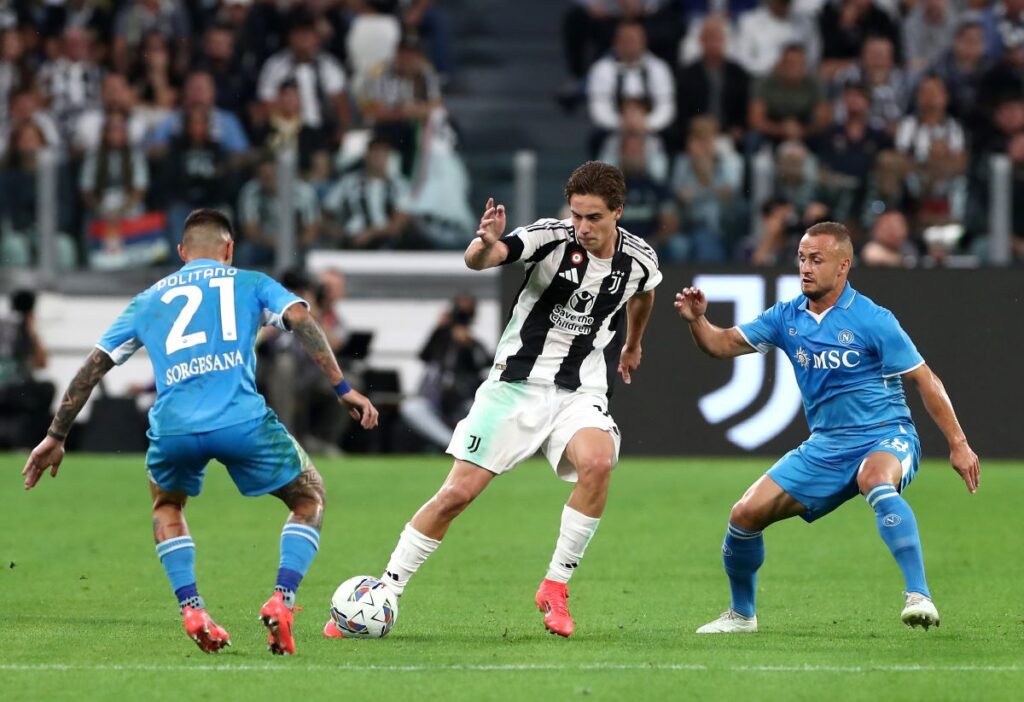 Serie A: Napoli vs Juventus – probable line-ups and where to watch on TV 24 TURIN, ITALY - SEPTEMBER 21: Kenan Yildiz of Juventus controls the ball under pressure from Matteo Politano and Stanislav Lobotka of Napoli during the Serie A match between Juventus and Napoli at Allianz Stadium on September 21, 2024 in Turin, Italy. (Photo by Marco Luzzani/Getty Images)