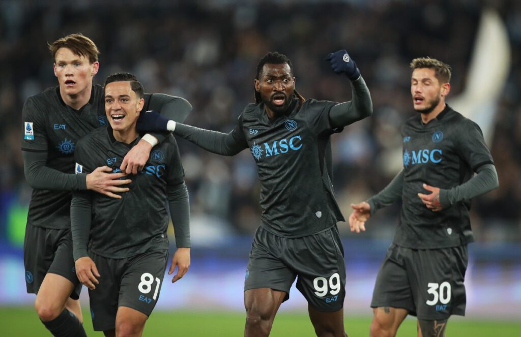 ROME, ITALY - FEBRUARY 15: Napoli players celebrate Adam Marusic of Lazio (not pictured) own goal during the Serie A match between SS Lazio and Napoli at Stadio Olimpico on February 15, 2025 in Rome, Italy. (Photo by Paolo Bruno/Getty Images)