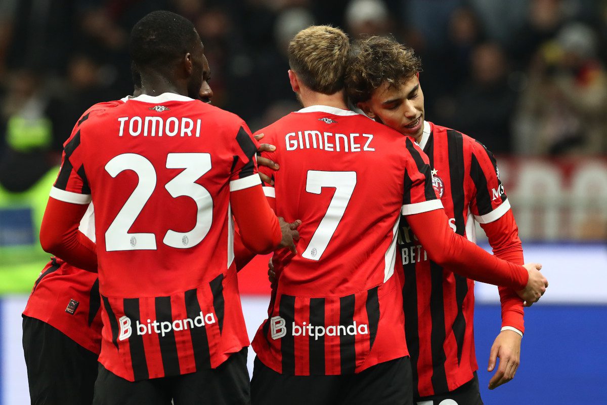 MILAN, ITALY - FEBRUARY 05: Joao Felix of AC Milan celebrates scoring his team's third goal with teammate Santiago Gimenez during the Coppa Italia Quarter Final match between AC Milan and AS Roma at Stadio Giuseppe Meazza on February 05, 2025 in Milan, Italy. (Photo by Marco Luzzani/Getty Images)