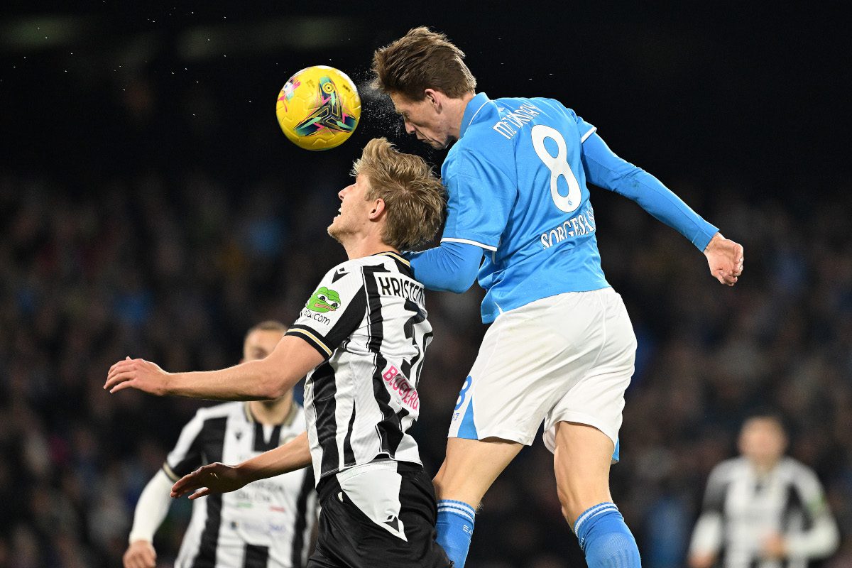 NAPLES, ITALY - FEBRUARY 09: Scott McTominay of Napoli battles for possession with Thomas Kristensen of Udinese during the Serie A match between Napoli and Udinese at Stadio Diego Armando Maradona on February 09, 2025 in Naples, Italy. (Photo by Francesco Pecoraro/Getty Images)