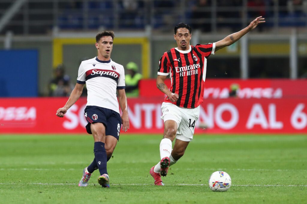 Serie A Top 5 transfer news of the day: Zirkzee, Reijnders, Vlahovic updates 11 MILAN, ITALY - MAY 09: Nikola Moro of Bologna passes the ball whilst under pressure from Tijjani Reijnders of AC Milan during the Serie A match between AC Milan and Bologna at Stadio Giuseppe Meazza on May 09, 2025 in Milan, Italy. (Photo by Marco Luzzani/Getty Images)