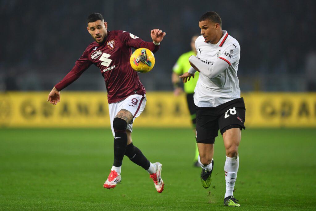 TURIN, ITALY - FEBRUARY 22: Antonio Sanabria of Torino battles for possession with Malick Thiaw of AC Milan during the Serie A match between Torino and AC Milan at Stadio Olimpico di Torino on February 22, 2025 in Turin, Italy. (Photo by Valerio Pennicino/Getty Images)
