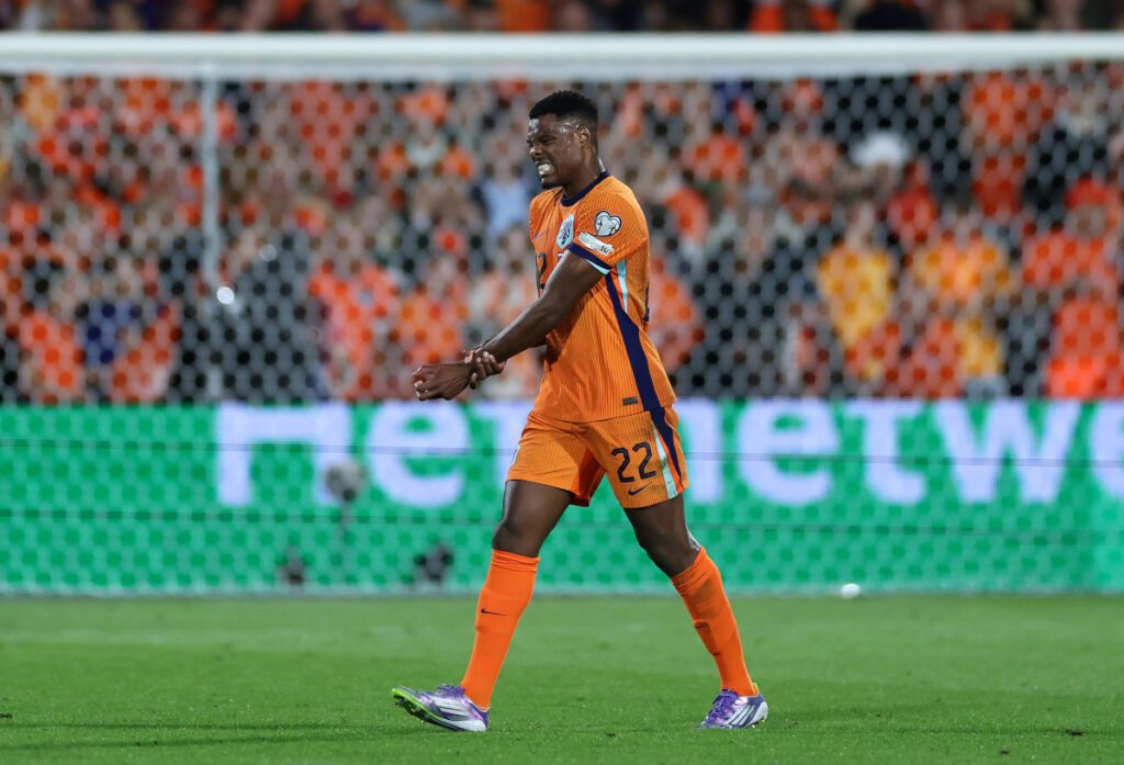 De Bruyne and Dumfries on target in 2026 World Cup qualifiers 6 ROTTERDAM, NETHERLANDS - SEPTEMBER 04: Denzel Dumfries of the Netherlands holds his wrist as he appears injured after scoring his team's first goal during the FIFA World Cup 2026 qualifier match between Netherlands and Poland at De Kuip on September 04, 2025 in Rotterdam, Netherlands. (Photo by Dean Mouhtaropoulos/Getty Images)