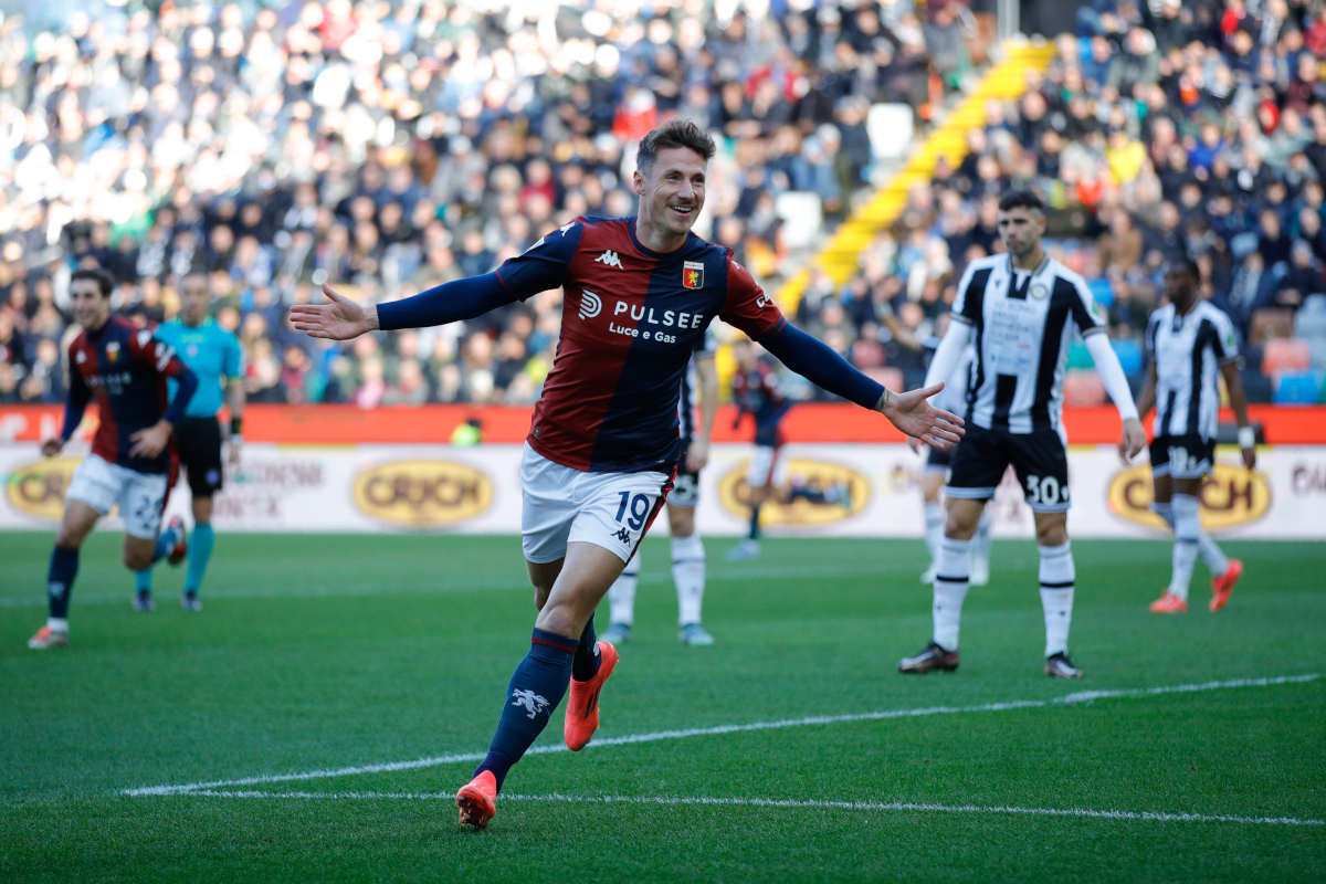 UDINE, ITALY - DECEMBER 01: Andrea Pinamonti of Genoa celebrates scoring the opening goal during the Serie A match between Udinese and Genoa at Stadio Friuli on December 01, 2024 in Udine, Italy. (Photo by Timothy Rogers/Getty Images)