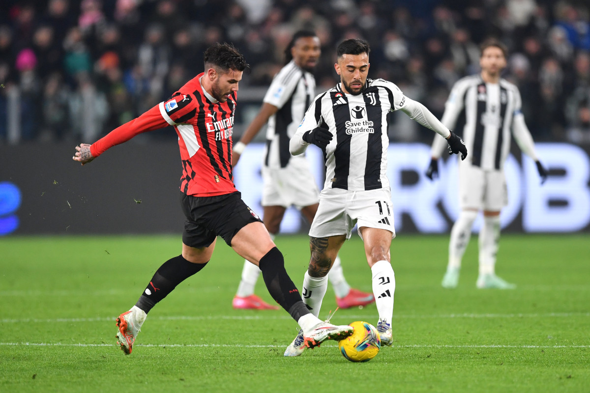 TURIN, ITALY - JANUARY 18: Nicolas Gonzalez of Juventus is challenged by Theo Hernandez of AC Milan during the Serie A match between Juventus and AC Milan at Allianz Stadium on January 18, 2025 in Turin, Italy. (Photo by Valerio Pennicino/Getty Images)