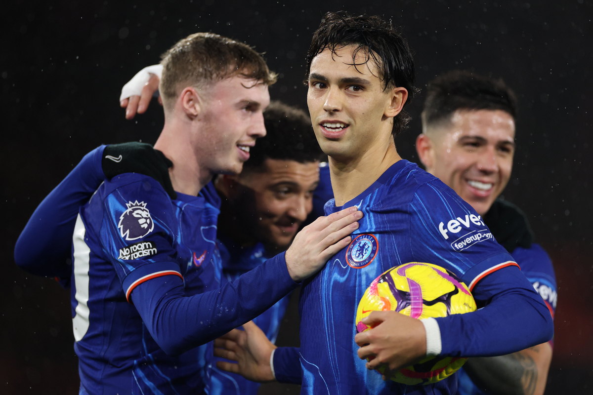 Cole Palmer of Chelsea celebrates with teammate Joao Felix after scoring his team's fourth goal during the Premier League match between Southampton FC and Chelsea FC at St Mary's Stadium on December 04, 2024 in Southampton, England. (Photo by Michael Steele/Getty Images)