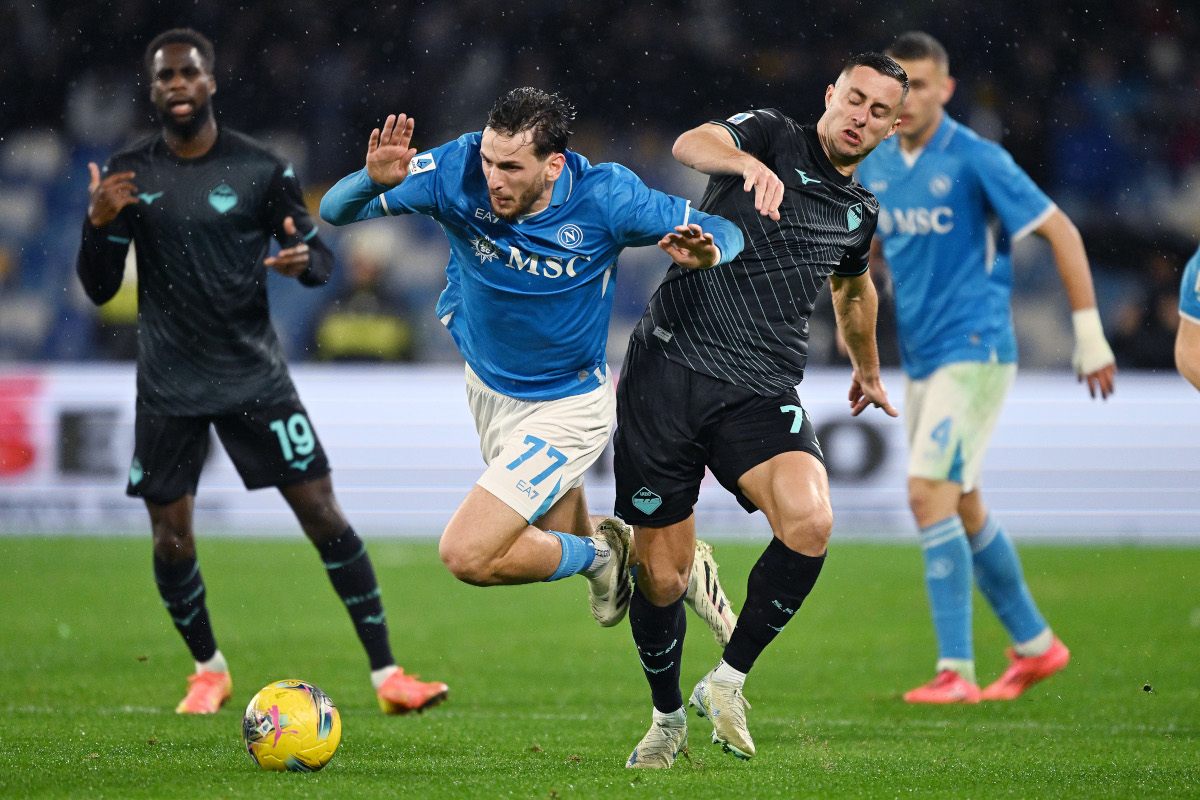 NAPLES, ITALY - DECEMBER 08: Khvicha Kvaratskhelia of Napoli battles for possession with Adam Marusic of SS Lazio during the Serie A match between Napoli and SS Lazio at Stadio Diego Armando Maradona on December 08, 2024 in Naples, Italy. (Photo by Francesco Pecoraro/Getty Images)