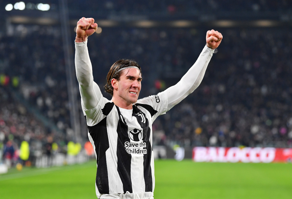 TURIN, ITALY - DECEMBER 17: Dusan Vlahovic of Juventus celebrates scoring his team's first goal during the Coppa Italia match between Juventus FC and Cagliari Calcio at Allianz Stadium on December 17, 2024 in Turin, Italy. (Photo by Valerio Pennicino/Getty Images)