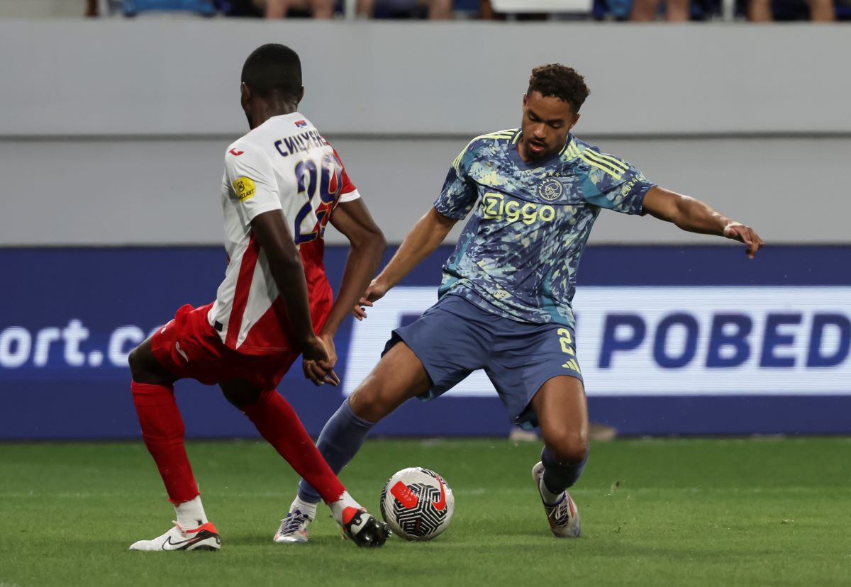 BACKA TOPOLA, SERBIA - AUGUST 01: Devyne Rensch (R) of Ajax in action against Collins Sichenje (L) of Vojvodina during the UEFA Europa League Second Qualifying Round 2nd leg match between FK Vojvodina and FC Ajax at TSC Arena on August 01, 2024 in Backa Topola, Serbia. (Photo by Srdjan Stevanovic/Getty Images)