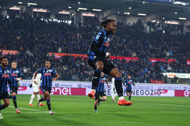 BERGAMO, ITALY - DECEMBER 06: Ademola Lookman of Atalanta celebrates after scoring the his team's second goal during the Serie A match between Atalanta and AC Milan at Gewiss Stadium on December 06, 2024 in Bergamo, Italy. (Photo by Giuseppe Cottini/Getty Images)