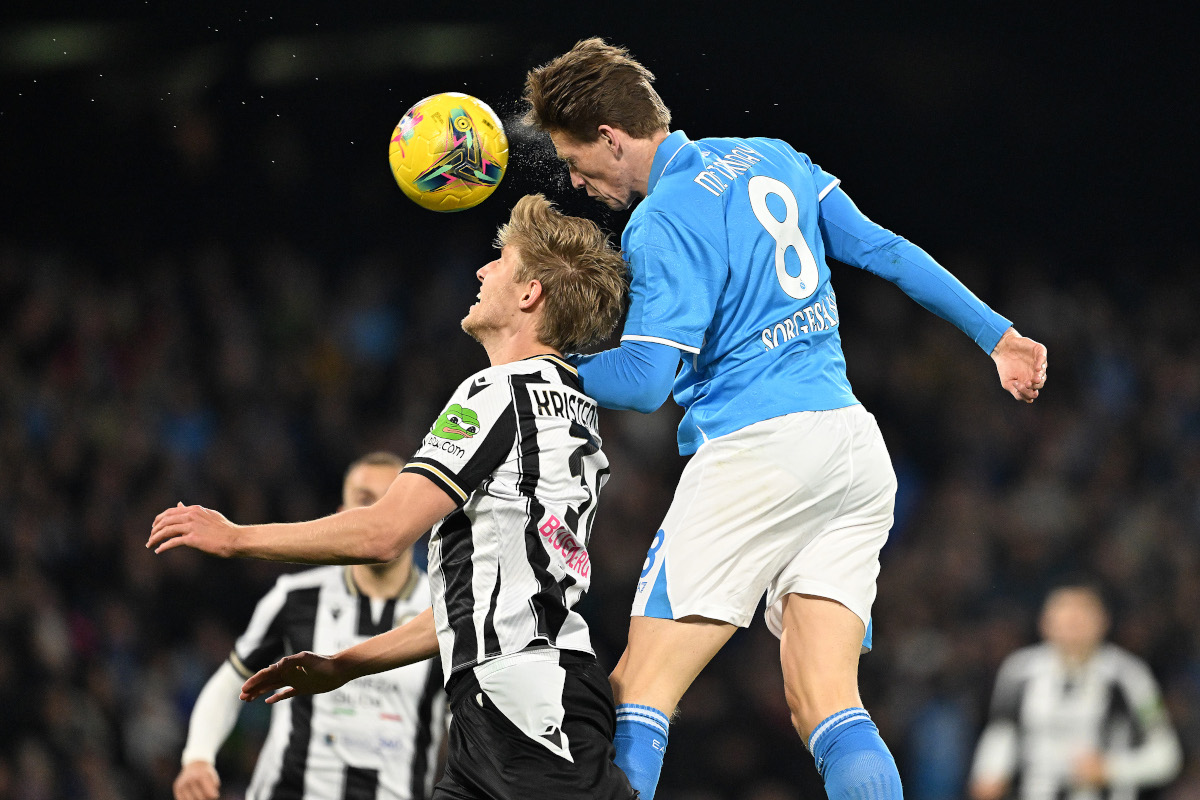 NAPLES, ITALY - FEBRUARY 09: Scott McTominay of Napoli battles for possession with Thomas Kristensen of Udinese during the Serie A match between Napoli and Udinese at Stadio Diego Armando Maradona on February 09, 2025 in Naples, Italy. (Photo by Francesco Pecoraro/Getty Images)
