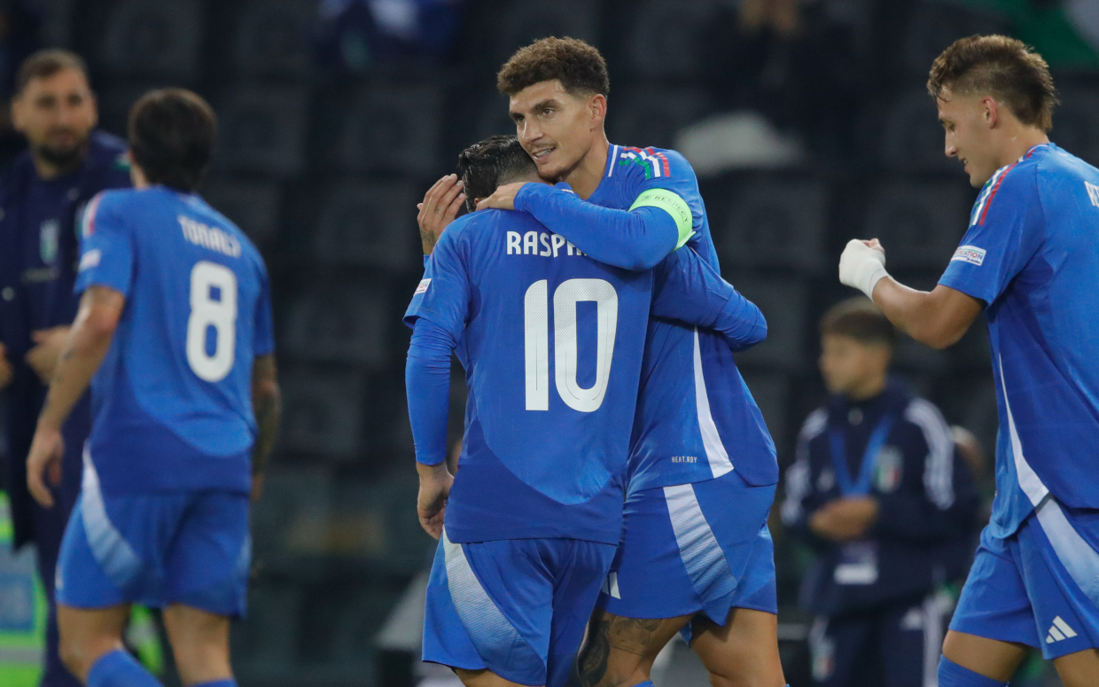 UDINE, ITALY - OCTOBER 14: Giovanni Di Lorenzo of Italy celebrates scoring a goal with teammate Giacomo Raspaddori during the UEFA Nations League 2024/25 League A Group A2 match between Italy and Israel at Stadio Friuli on October 14, 2024 in Udine, Italy. (Photo by Timothy Rogers/Getty Images)