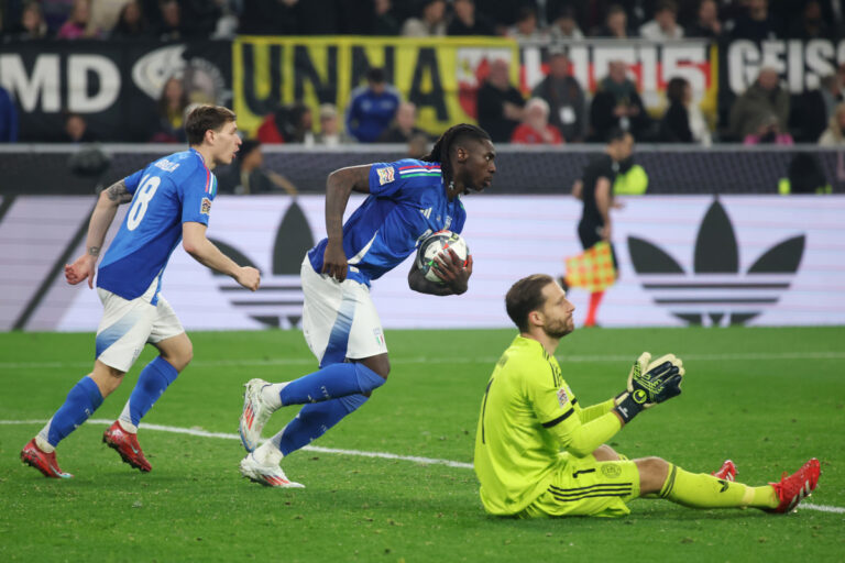 DORTMUND, GERMANY - MARCH 23: Moise Kean of Italy celebrates scoring his team's first goal during the UEFA Nations League Quarterfinal Leg Two match between Germany and Italy at Football Stadium Dortmund on March 23, 2025 in Dortmund, Germany. (Photo by Alex Grimm/Getty Images)