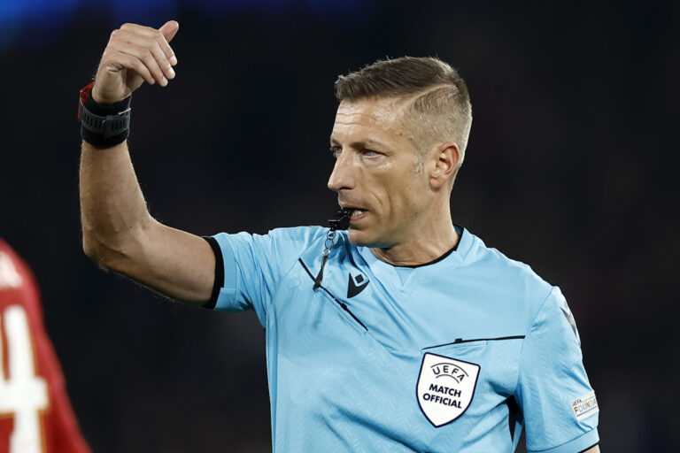 epa11943091 Referee Davide Massa gestures during the UEFA Champions League Round of 16, 1st leg soccer match between Paris Saint-Germain and Liverpool FC, in Paris, France, 05 March 2025. EPA-EFE/YOAN VALAT