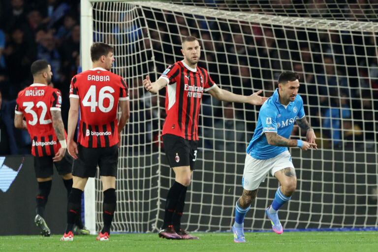 NAPOLI, ITALY – MARCH 30: Matteo Politano of Napoli celebrates after scoring his side first goal, beside Strahinja Pavlovic of AC Milan shows his disappointment during the Serie A match between Napoli and AC Milan at Stadio Diego Armando Maradona on March 30, 2025 in Napoli, Italy. (Photo by Francesco Pecoraro/Getty Images)