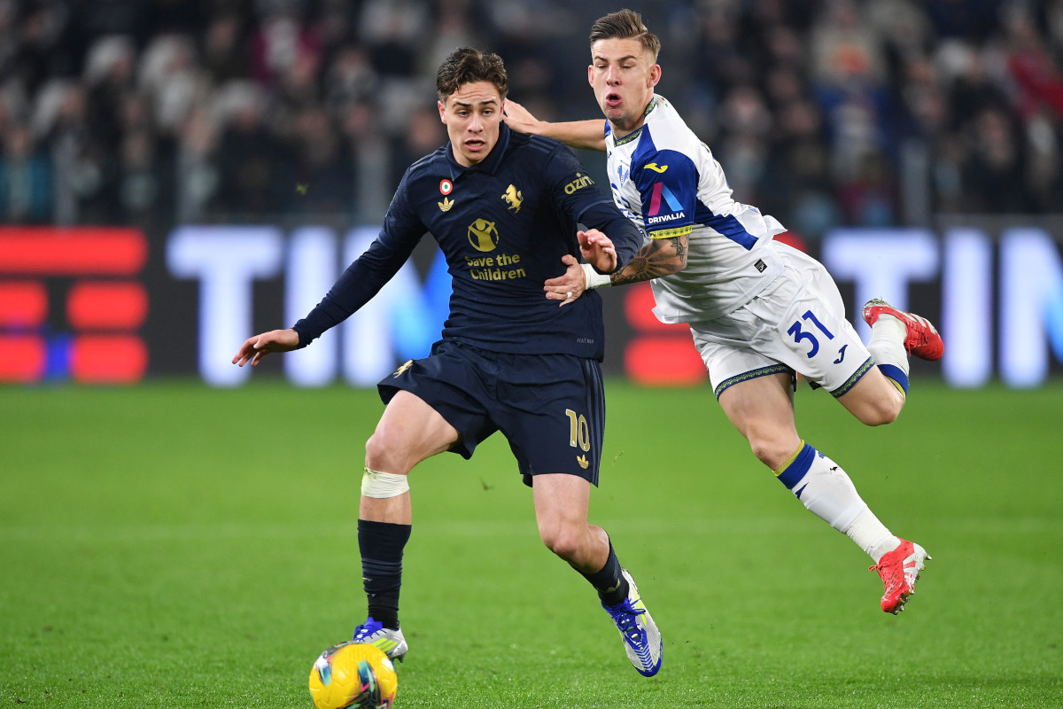 TURIN, ITALY - MARCH 03: Kenan Yildiz of Juventus is challenged by Tomas Suslov of Hellas Verona during the Serie A match between Juventus and Verona at Allianz Stadium on March 03, 2025 in Turin, Italy. (Photo by Valerio Pennicino/Getty Images)