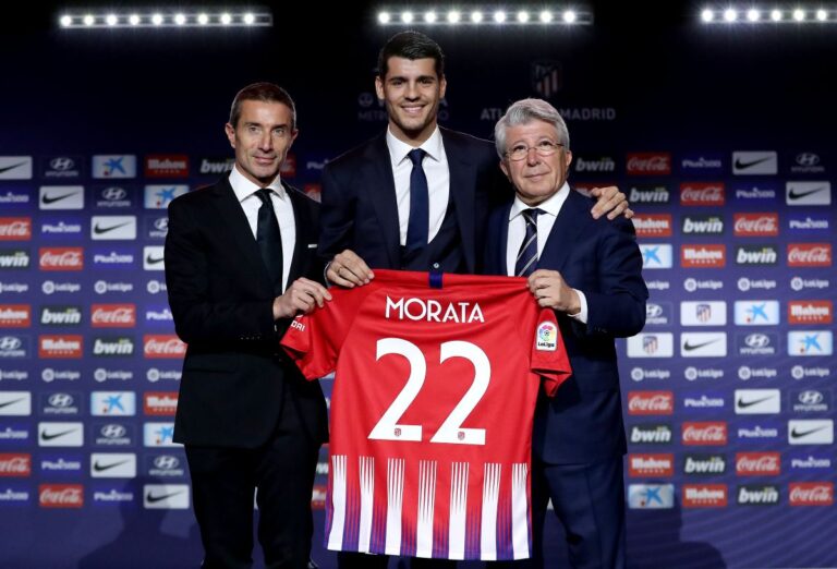 MADRID, SPAIN - JANUARY 29: Alvaro Morata of Club Atletico de Madrid poses for a photo with Enrique Cerezo, President of Club Atletico de Madrid (R) and Andrea Berta, Sports Manager of Club Atletico de Madrid (L) during the Club Atletico de Madrid player presentation of Alvaro Morata at Wanda Metropolitano on January 29, 2019 in Madrid, Spain. (Photo by Gonzalo Arroyo Moreno/Getty Images)
