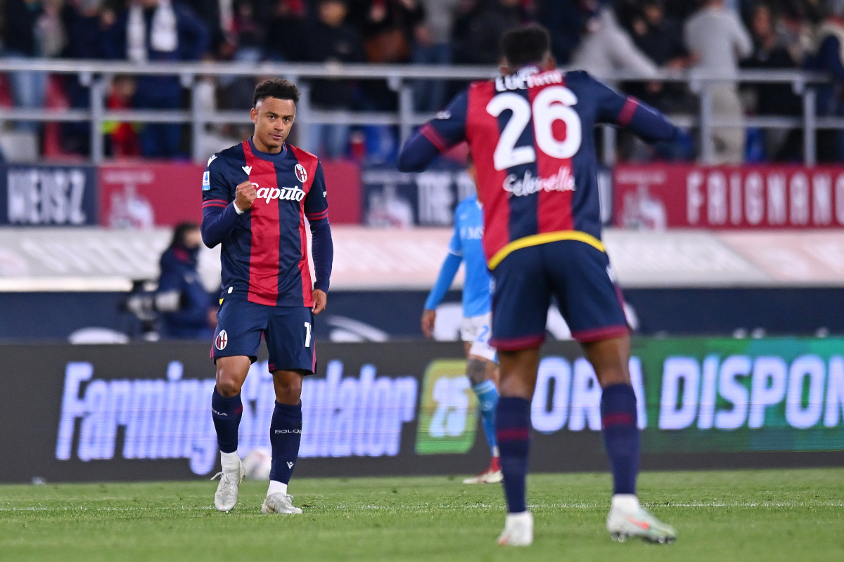 BOLOGNA, ITALY - APRIL 07: Dan Ndoye of Bologna celebrates scoring his team's first goal with teammate Jhon Lucumi during the Serie A match between Bologna and Napoli at Stadio Renato Dall'Ara on April 07, 2025 in Bologna, Italy. (Photo by Alessandro Sabattini/Getty Images)