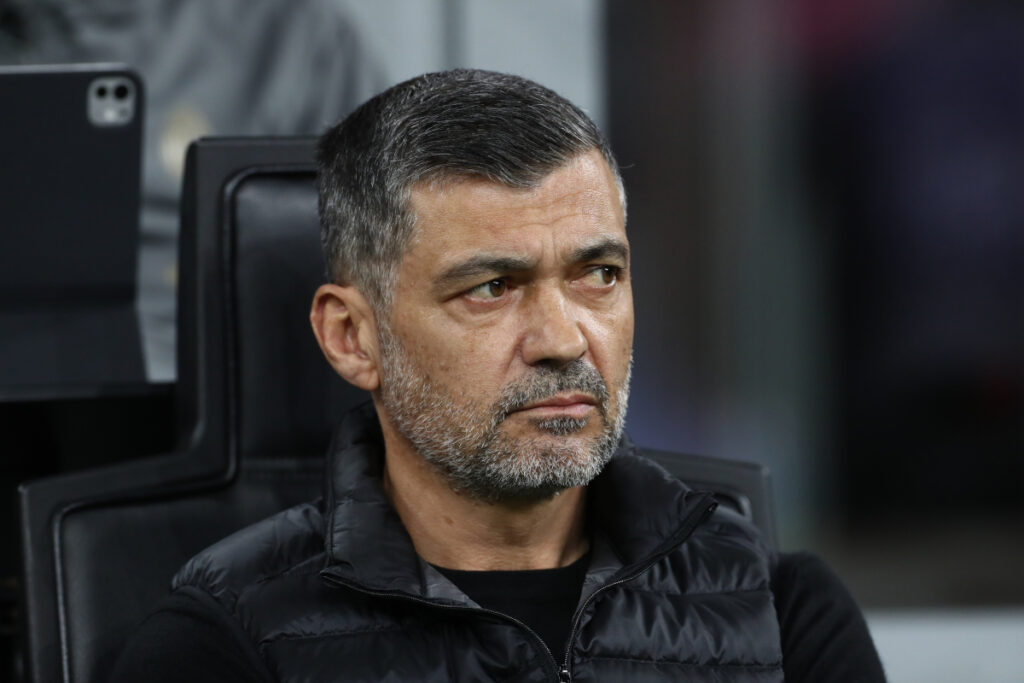 MILAN, ITALY - APRIL 02: Sergio Conceicao, Head Coach of AC Milan, looks on from the dugout prior to the Coppa Italia Semi Final match between AC Milan and FC Internazionale at Stadio Giuseppe Meazza on April 02, 2025 in Milan, Italy. (Photo by Marco Luzzani/Getty Images)