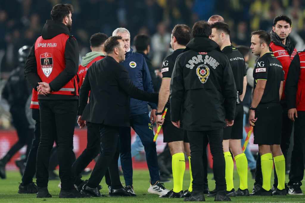 ISTANBUL, TURKEY APRIL 2: Head coach Jose Mourinho of Fenerbahce confront with head coach Okan Buruk of Galatasaray celebrates victory during the Turkish Super League match between Fenerbahce and Galatasaray at Ulker Sukru Saracoglu Stadium on April 2, 2025 in Istanbul, Turkey. (Photo by Ahmad Mora/Getty Images)