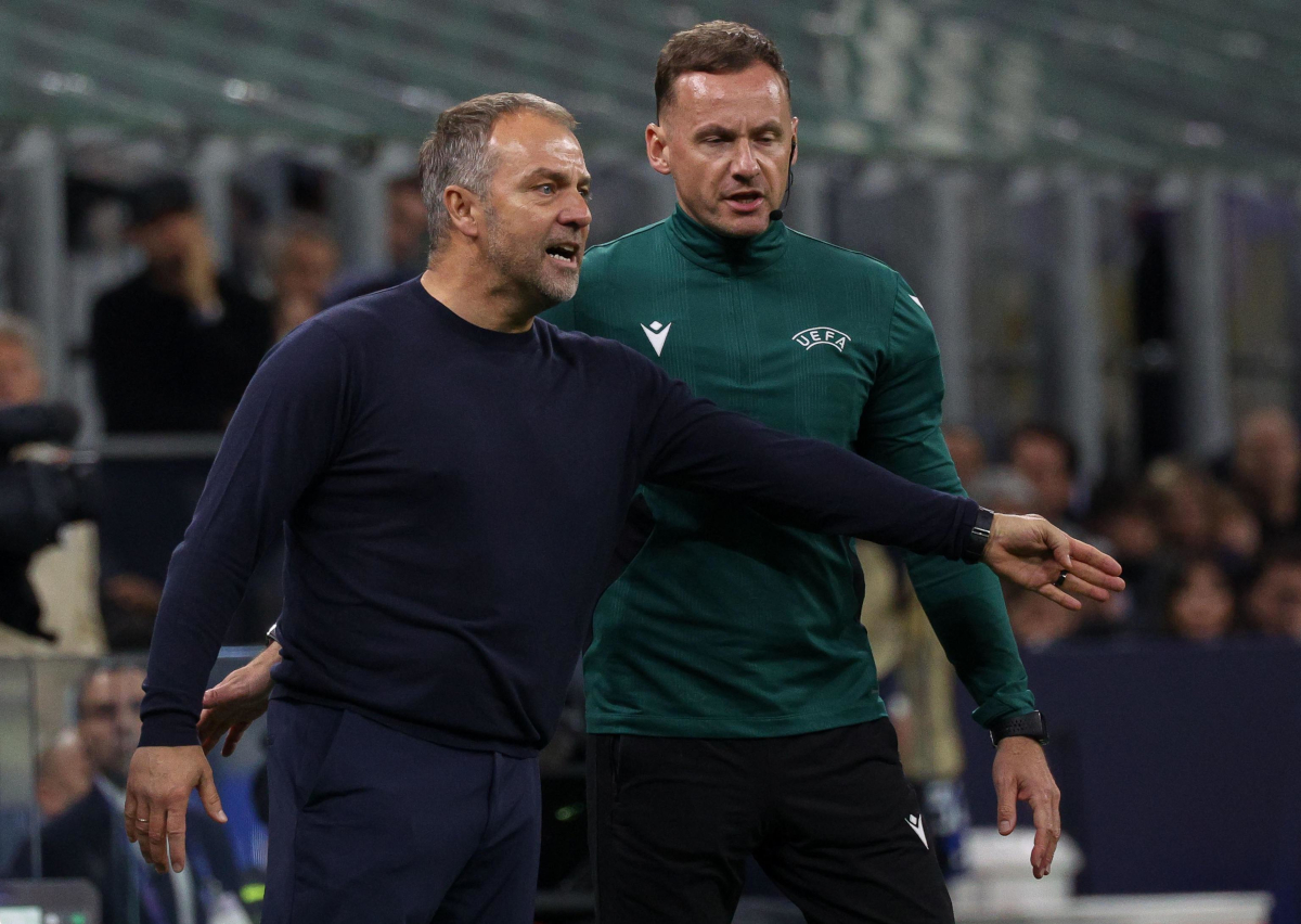 Barcelona should learn Inter lesson rather than complaining about referee 4 epa12078787 FC Barcelona's head coach Hansi Flick gestures next to the fourth official Pawel Raczkowski during the UEFA Champions League semifinal 2nd leg soccer match between Inter Milan and FC Barcelona, in Milan, Italy, 06 May 2025. EPA-EFE/ROBERTO BREGANI