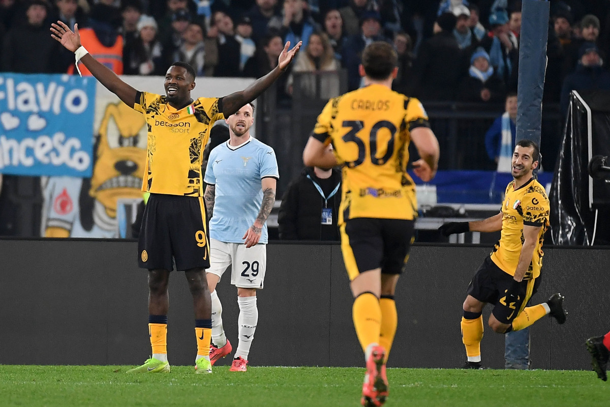 ROME, ITALY - DECEMBER 16: Marcus Thuram of SS Inter celebrates the sixth goal of his team during the Serie match between Lazio and Inter at Stadio Olimpico on December 16, 2024 in Rome, Italy. (Photo by Marco Rosi - SS Lazio/Getty Images)