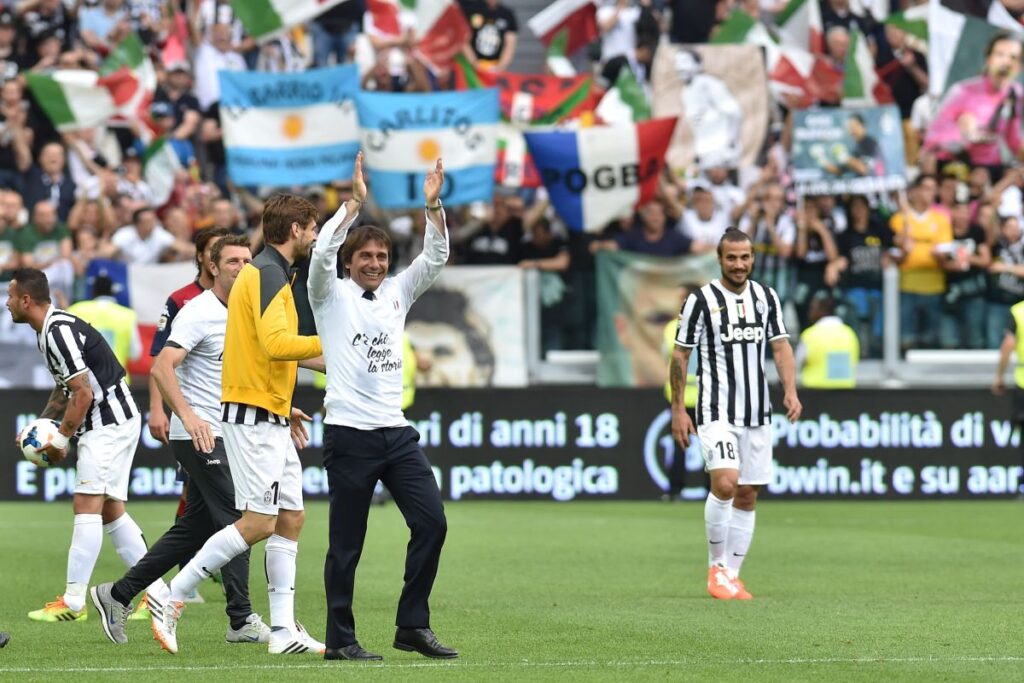 TURIN, ITALY - MAY 18: Juventus FC head coach Antonio Conte celebrates 102 points in the championship at the end of the Serie A match between Juventus and Cagliari Calcio at Juventus Arena on May 18, 2014 in Turin, Italy. (Photo by Valerio Pennicino/Getty Images)