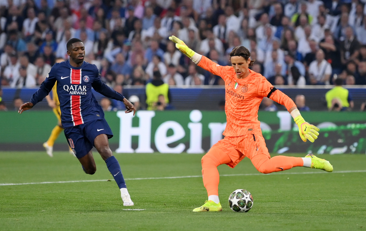 MUNICH, GERMANY - MAY 31: Yann Sommer of FC Internazionale kicks the ball clear whilst under pressure from Ousmane Dembele of Paris Saint-Germain during the UEFA Champions League Final 2025 between Paris Saint-Germain and FC Internazionale Milano at Munich Football Arena on May 31, 2025 in Munich, Germany. (Photo by Justin Setterfield/Getty Images)