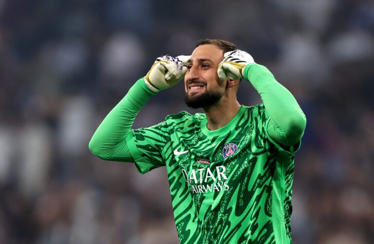 MUNICH, GERMANY - MAY 31: Gianluigi Donnarumma of Paris Saint-Germain celebrates after Desire Doue of Paris Saint-Germain (not pictured) scores his team's second goal during the UEFA Champions League Final 2025 between Paris Saint-Germain and FC Internazionale Milano at Munich Football Arena on May 31, 2025 in Munich, Germany. (Photo by Lars Baron/Getty Images)