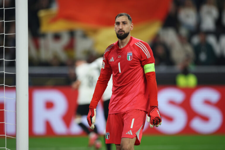 DORTMUND, GERMANY - MARCH 23: Gianluigi Donnarumma of Italy looks dejected after Tim Kleindienst of Germany (not pictured) scores his team's second goal during the UEFA Nations League Quarterfinal Leg Two match between Germany and Italy at Football Stadium Dortmund on March 23, 2025 in Dortmund, Germany. (Photo by Alex Grimm/Getty Images)