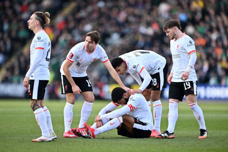 PLYMOUTH, ENGLAND - FEBRUARY 09: Joe Gomez of Liverpool reacts on the floor as Kostas Tsimikas, Federico Chiesa, Jarell Quansah of Liverpool and Harvey Elliott of Liverpool looks on during the Emirates FA Cup Fourth Round match between Plymouth Argyle and Liverpool at Home Park on February 09, 2025 in Plymouth, England. (Photo by Dan Mullan/Getty Images)