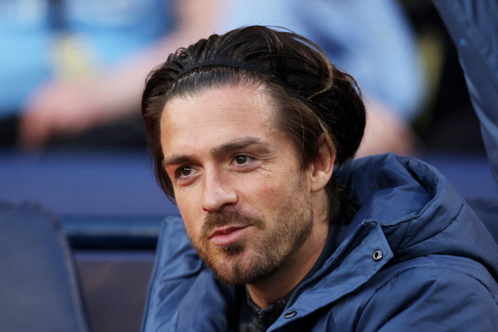 MANCHESTER, ENGLAND - APRIL 22: Jack Grealish of Manchester City looks on from the substitutes bench prior to the Premier League match between Manchester City FC and Aston Villa FC at Etihad Stadium on April 22, 2025 in Manchester, England. (Photo by Carl Recine/Getty Images)