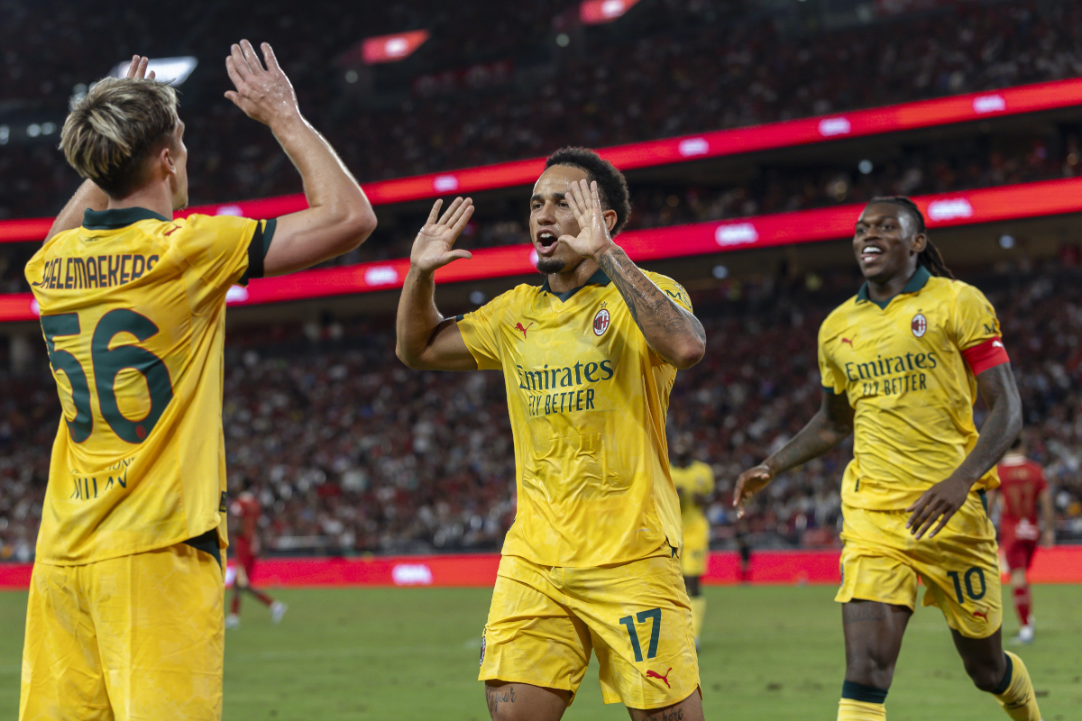 HONG KONG, CHINA - JULY 26: Noah Okafor of AC Milan (C) celebrates after scoring his goal with Alexis Saelemaekers of AC Milan (L) and Rafael Leao of AC Milan (R) during the Liverpool FC v AC Milan Pre-Season Friendly match at Kai Tak Stadium on July 26, 2025 in Hong Kong, China. (Photo by Yu Chun Christopher Wong/Eurasia Sport Images/Getty Images)