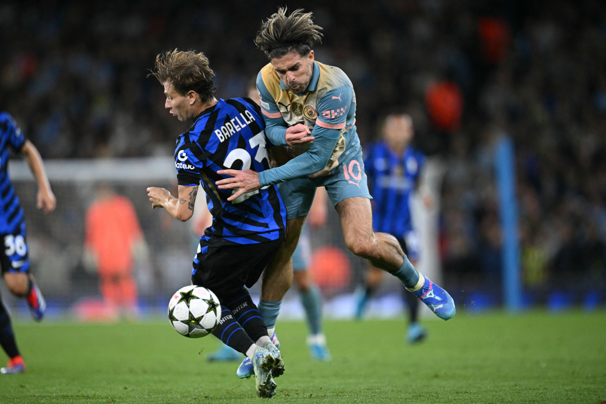 Grealish’s Amalfi Coast holiday sparks Napoli transfer rumours 7 Inter Milan's Italian midfielder #23 Nicolo Barella (L) fouls Manchester City's English midfielder #10 Jack Grealish (R) during the UEFA Champions League, league phase football match between Manchester City and Inter Milan at the Etihad stadium, in Manchester, north-west England, on September 18, 2024 (Photo by Oli SCARFF / AFP) (Photo by OLI SCARFF/AFP via Getty Images)