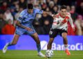 BUENOS AIRES, ARGENTINA - MAY 18: Pablo Solari of River Plate competes for the ball with Mariano Troilo of Belgrano during a match between River Plate and Belgrano as part of Liga Profesional 2024 at Estadio Mas Monumental Antonio Vespucio Liberti on May 18, 2024 in Buenos Aires, Argentina. (Photo by Marcelo Endelli/Getty Images)