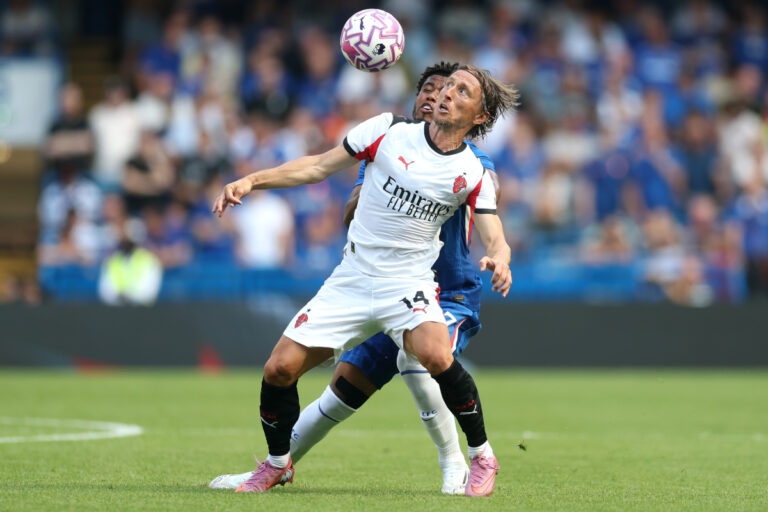 LONDON, ENGLAND - AUGUST 10: Luka Modric of AC Milan is put under pressure by Cole Palmer of Chelsea during the pre-season friendly match between Chelsea and AC Milan at Stamford Bridge on August 10, 2025 in London, England. (Photo by Richard Pelham/Getty Images)