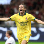 MILANO, Italia - 14 settembre: Luka Modric di AC Milan celebra segnando il primo gol della sua squadra durante la partita di Serie A tra AC Milan e Bologna FC 1909 allo stadio di Giuseppe Meazza il 14 settembre 2025 a Milano, in Italia. (Foto di Marco Luzzani/Getty Images)